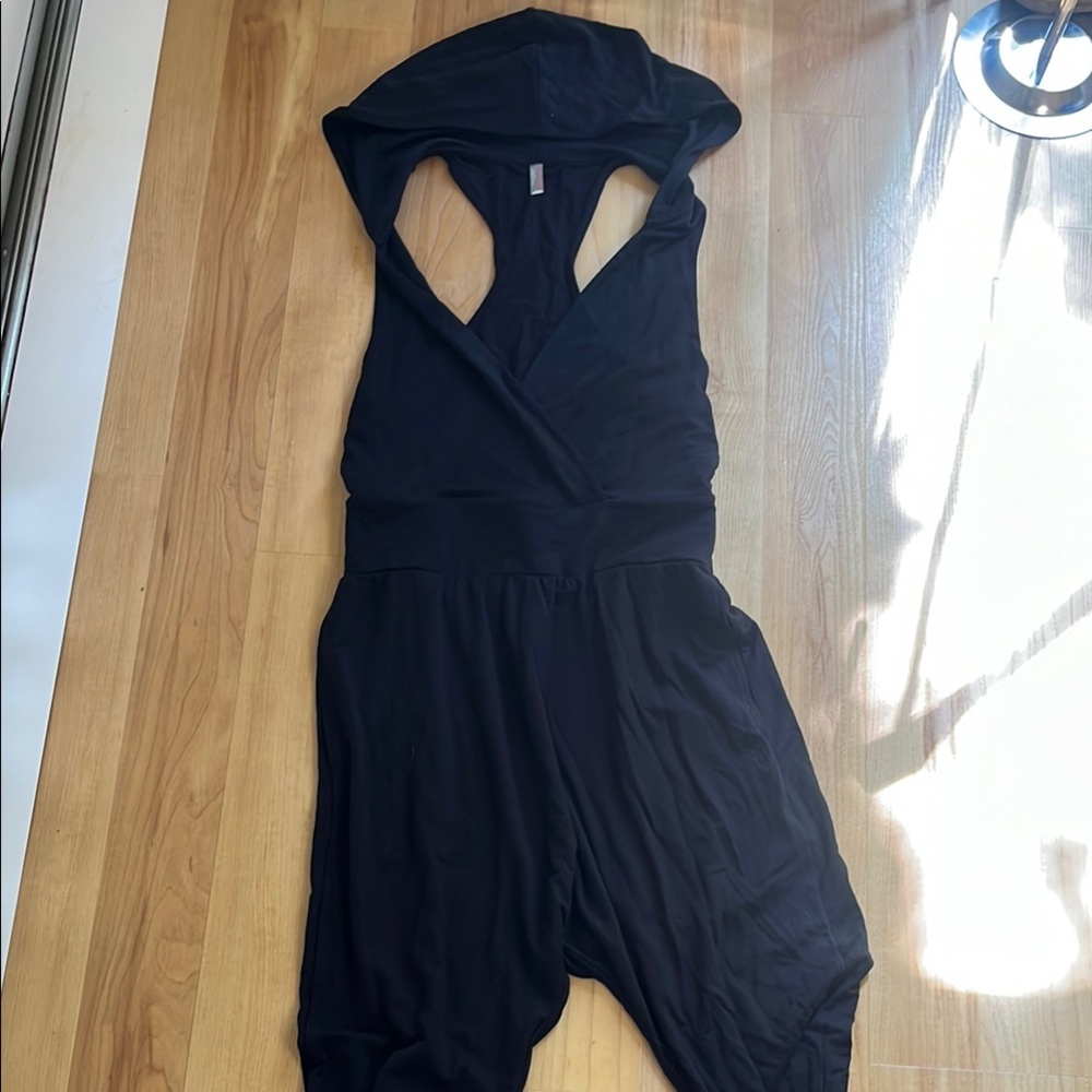 Free People Movement Black Hooded Jumpsuit. New Never Used without tags